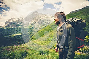 Bearded Man with backpack hiking Travel Lifestyle