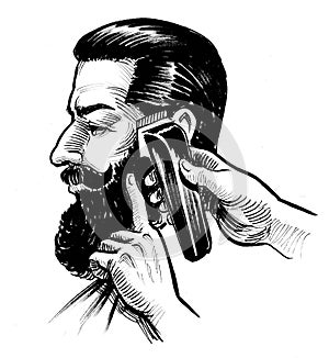 Bearded man and barbers hands