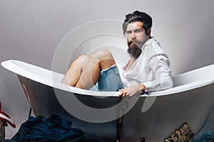 Bearded man in bathtub