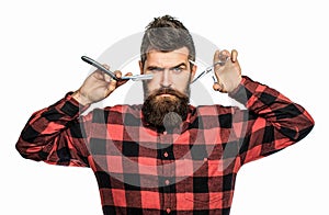 Bearded man, bearded male. Portrait of stylish man beard. Barber scissors and straight razor, barber shop. Vintage
