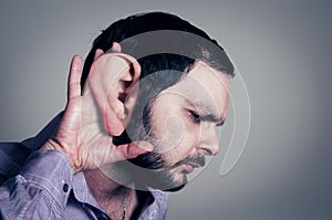 Bearded man with big ear
