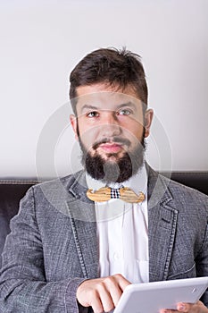 Bearded man with a bow tie