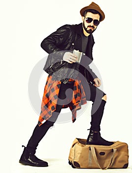 Bearded man, caucasian hipster with moustache holding flask