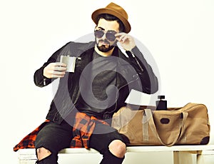 Bearded man, caucasian hipster with moustache holding flask