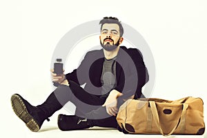 Bearded man, caucasian hipster with moustache and perfume bottle