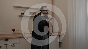 Bearded man with cup of tea