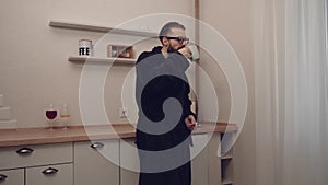 Bearded man with cup of tea