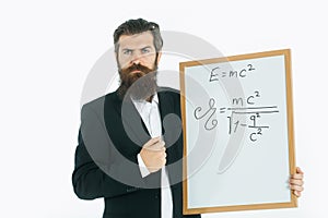 Bearded man with einstein formula and newtons law