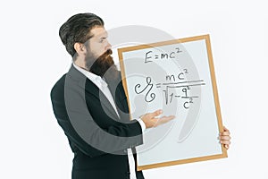 Bearded man with einstein formula and newtons law