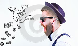 Bearded man with a hat and sunglasses