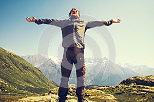 Bearded Man hiker hands raised outdoor