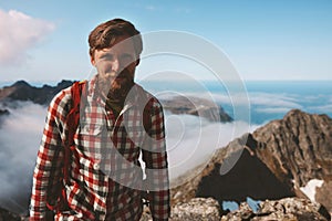 Bearded man hiking in mountains travel alone adventure backpacking outdoor