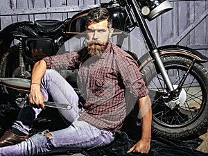 Bearded man hipster biker