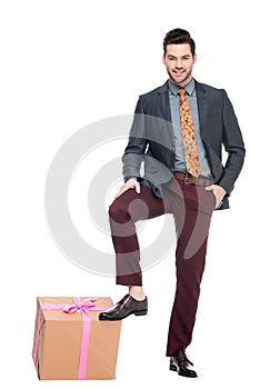 bearded man holding gift box,