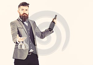 Bearded man holding red wine isolated on white backgroun