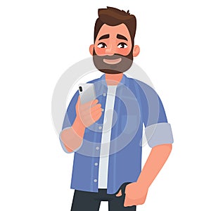Bearded man holds smartphone in hands. People and gadgets. Using the application in the phone