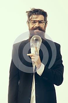 Bearded man with lamp as einstein formula symbol
