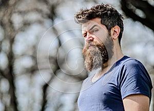 Bearded man with lush hair. Free and happy time. male fashion and beauty. brutal male with perfect style. Mature hipster