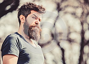 Bearded man with lush hair. Free and happy time. male fashion and beauty. brutal male with perfect style. Mature hipster