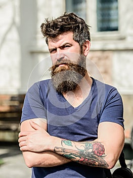 Bearded man outdoor. Beard care and barbershop. brutal male with perfect style. bearded man with lush hair. serious male