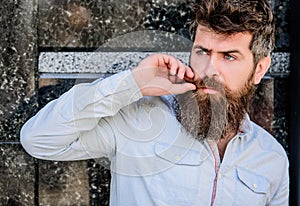 Bearded man outdoor. Beard care and barbershop. Mature hipster with beard. brutal male with perfect style. male fashion