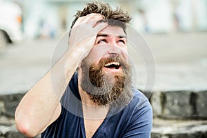 Bearded man outdoor. male fashion and beauty. brutal male with perfect style. bearded man with lush hair. Free and happy