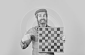 Bearded man play chess. Chess figures. Intellectual games. Grandmaster experienced player. Enjoy tournament. Game