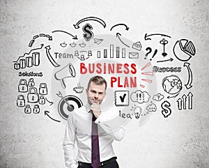 Bearded man, red and black business plan sketch