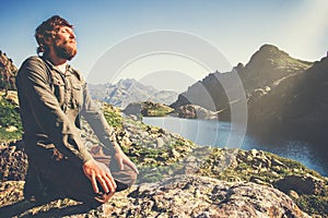 Bearded Man relaxing alone with nature Travel Lifestyle concept