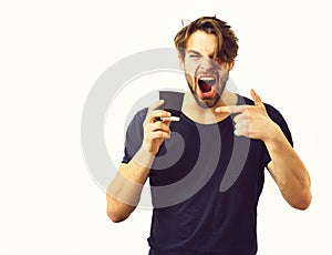 Caucasian young macho holding coffee cup