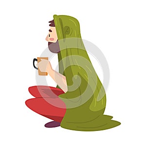 Bearded Man Sitting Under Cozy Plaid Enjoying Hot Drink Mug, Guy Drinking Beverage Wrapped in Green Blanket, Side View