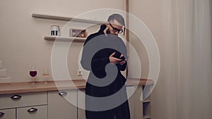 Bearded man with smartphone listening music