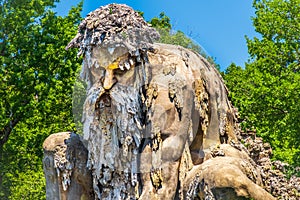 Bearded man statue colossus of Appennino giant statue public gardens of Demidoff Florence Italy close up photo