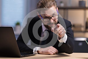 Bearded Man in Suit Making Blaming Index Finger Gesture