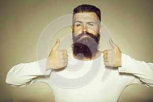 Bearded man with super gesture