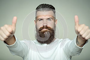 Bearded man with super gesture