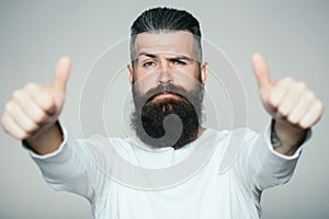 Bearded man with super gesture