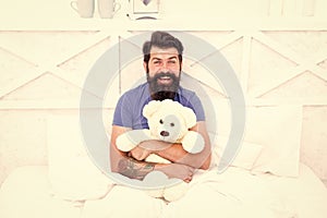 Bearded man teddy bear in bed. plush toy concept. Gift for holidays. present for you. Valentines day gift for beloved