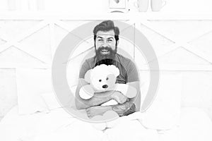 Bearded man teddy bear in bed. plush toy concept. Gift for holidays. present for you. Valentines day gift for beloved