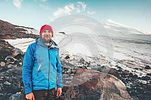 Bearded Man traveler happy smiling with Elbrus mountain on background