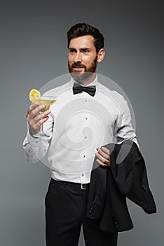 bearded man in tuxedo with bow