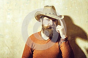 Bearded man wearing cowboy hat