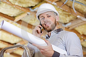 bearded man wears construction helmet photo