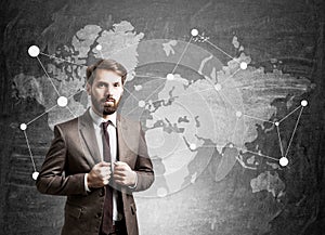 Bearded man and a world map photo