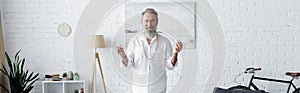 bearded master guru holding selenite crystals