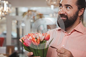 Bearded mature man shopping at home goods store