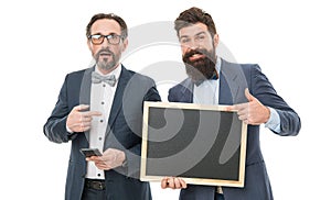bearded men hold advertisement blackboard. formal businessmen use phone, copy space. announcement. party invitation