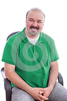 Bearded Middle Age Man Smiling on his Chair