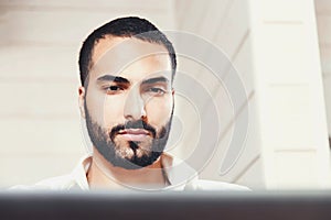 Bearded Multicultural Man Working With Laptop