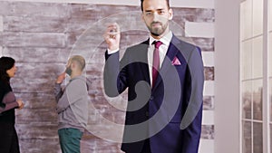 Bearded real estate agent in business suit